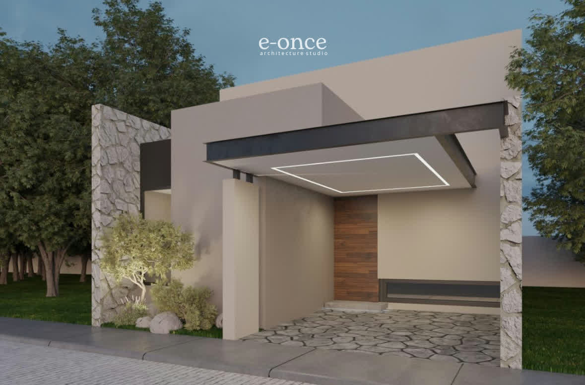 Acceso de la casa con marquesina iluminada